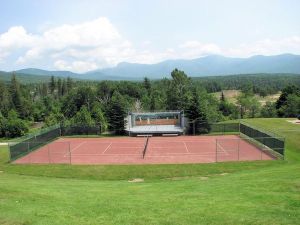 Tennis courts from the veranda. Mt. Washington, the tallest peak in the Presidential range, is in the background. Not so dramatic here