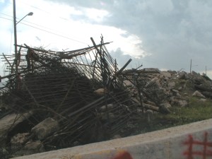 Debris piles, some created by Katrina, others by people clearing property