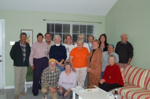 Master Gardeners all, we have a common language. Organizer Ruth seated, in red