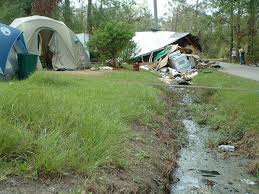 No shelter, living in tents, waiting for help